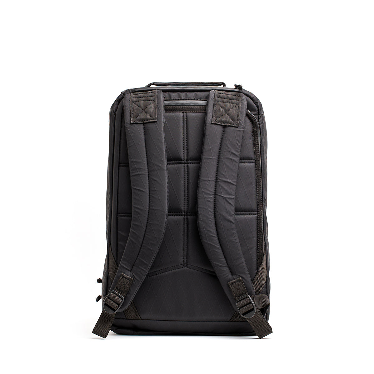 A black GR1 USA - X-PAC rucksack with padded straps is displayed from the back against a white background, highlighting its waterproof features.