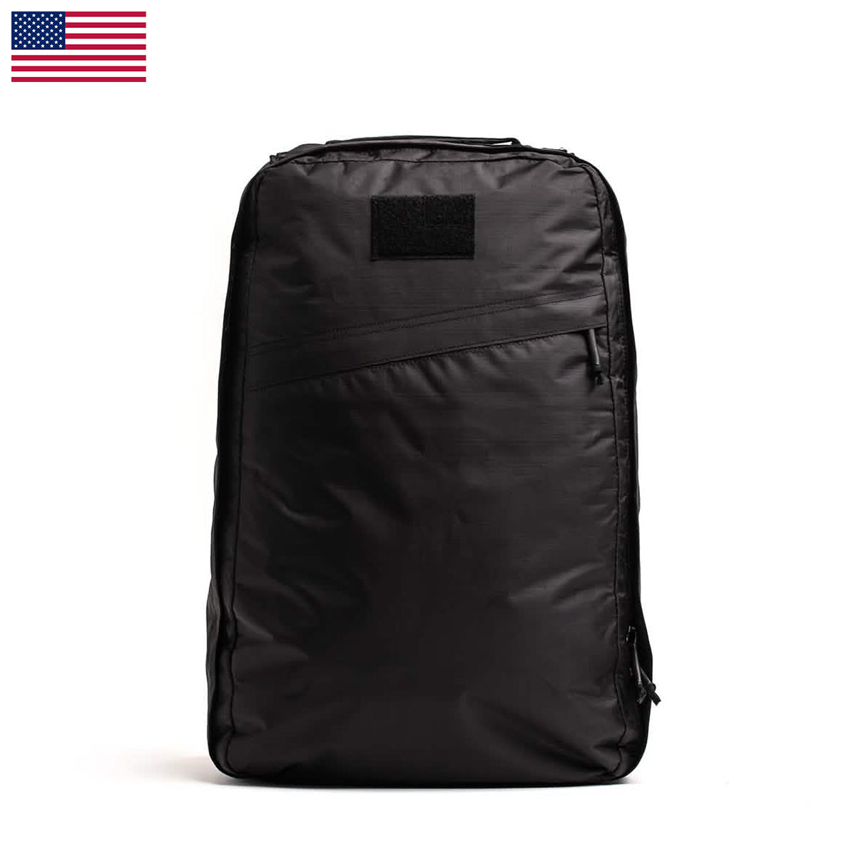 The GR1 USA - Dyneema rucksack features a minimalist design with a small loop on top, crafted from durable Dyneema material. It sports an American flag in the top left corner for added patriotism.