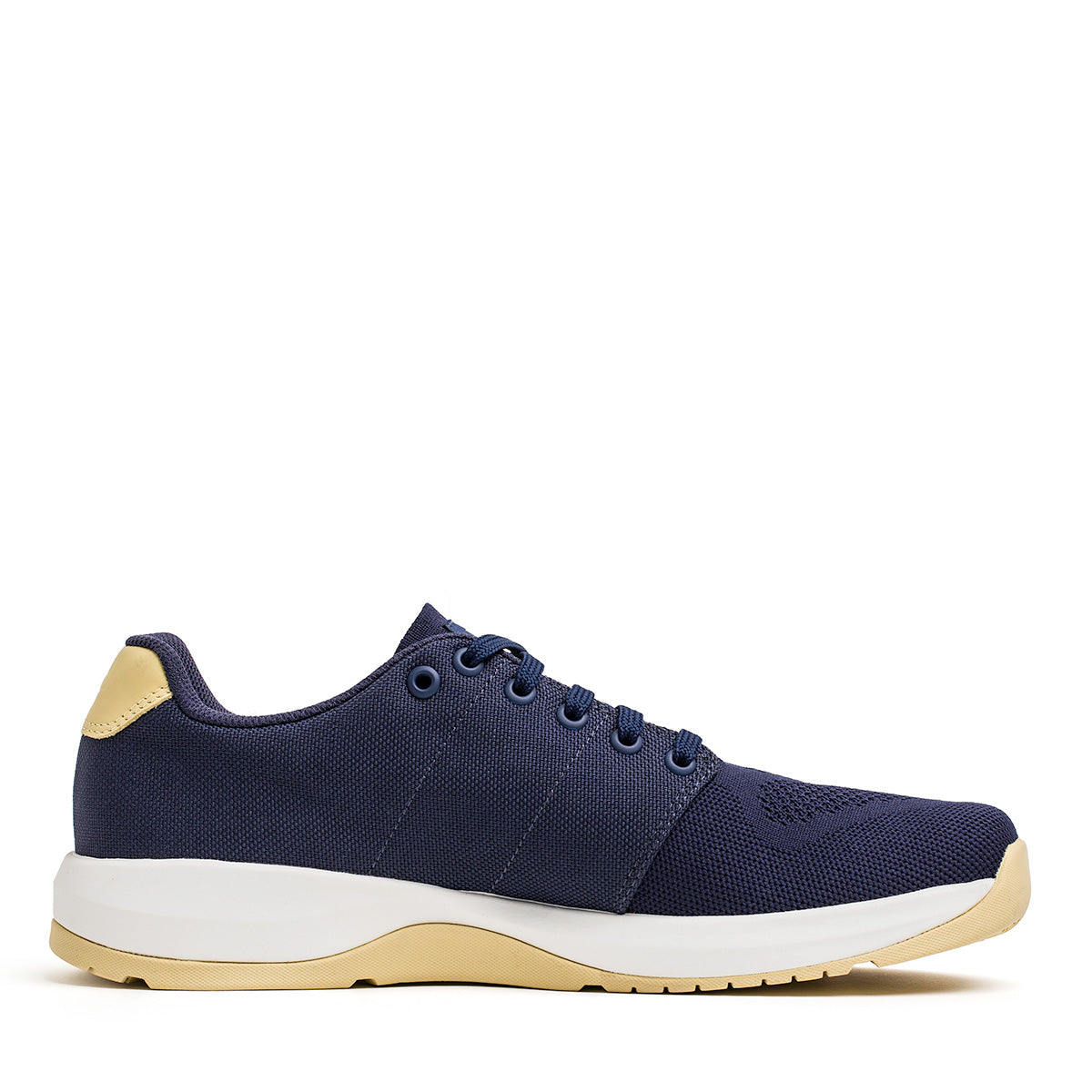 Side view of Women's Ballistic Trainers by GORUCK in navy blue with a white sole and gold accents, made from durable CORDURA® Ballistic Nylon, displayed on a white background.