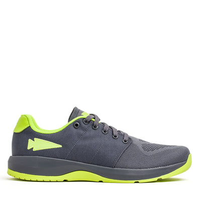 The Women's Ballistic Trainers in Wolf Grey and Acid Lime by GORUCK are crafted with CORDURA® Ballistic Nylon. They feature vibrant acid lime accents, including the inner lining, logo, and sole, complemented by dark laces for a sporty mesh design. Ideal for functional fitness enthusiasts seeking enhanced 3X Stability and a modern look.