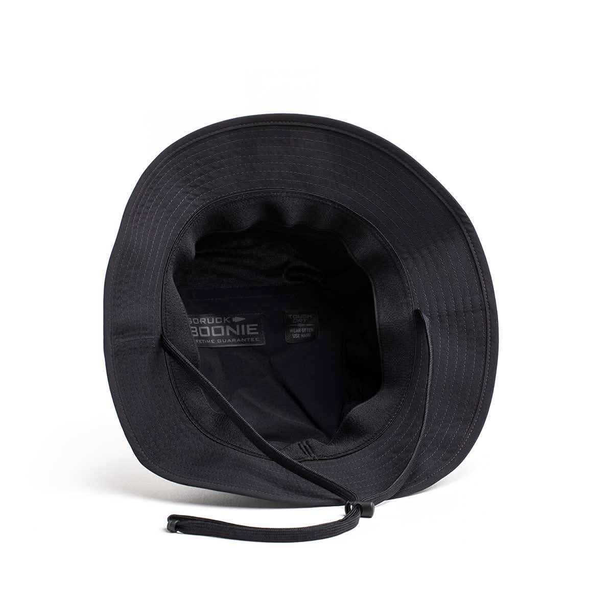 The Boonie Hat - Slick - ToughDry, in black, has a chin strap and is made from ToughDry® fabric for excellent protection. It features inner lining and branding visible from the top.