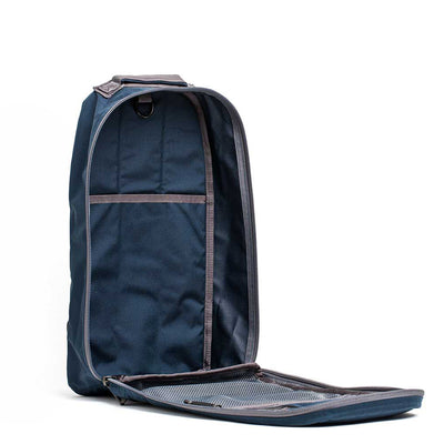 A navy blue 15L Bullet Ruck Classic - Cordura with its main compartment open, showing the interior mesh pocket.