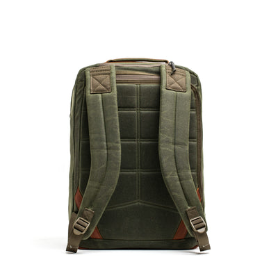 A green GR2 - Waxed Canvas backpack by GORUCK, crafted from durable waxed duck canvas and equipped with comfortable straps, reminiscent of a Heritage Retro Rucksack.