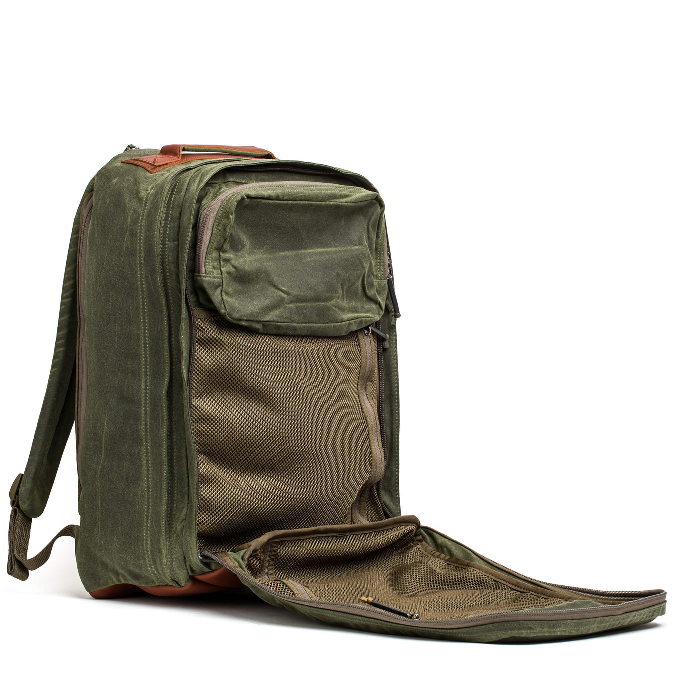 The GR2 - Waxed Canvas by GORUCK is shown open, showcasing its spacious interior. It features multiple compartments with zippers and mesh pockets, accented by Red Wing leather on the top handle. The waxed canvas design makes it practical for travel or commuting.