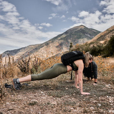 Woman working out in Cropped Training Leggings Pocket Ranger Green