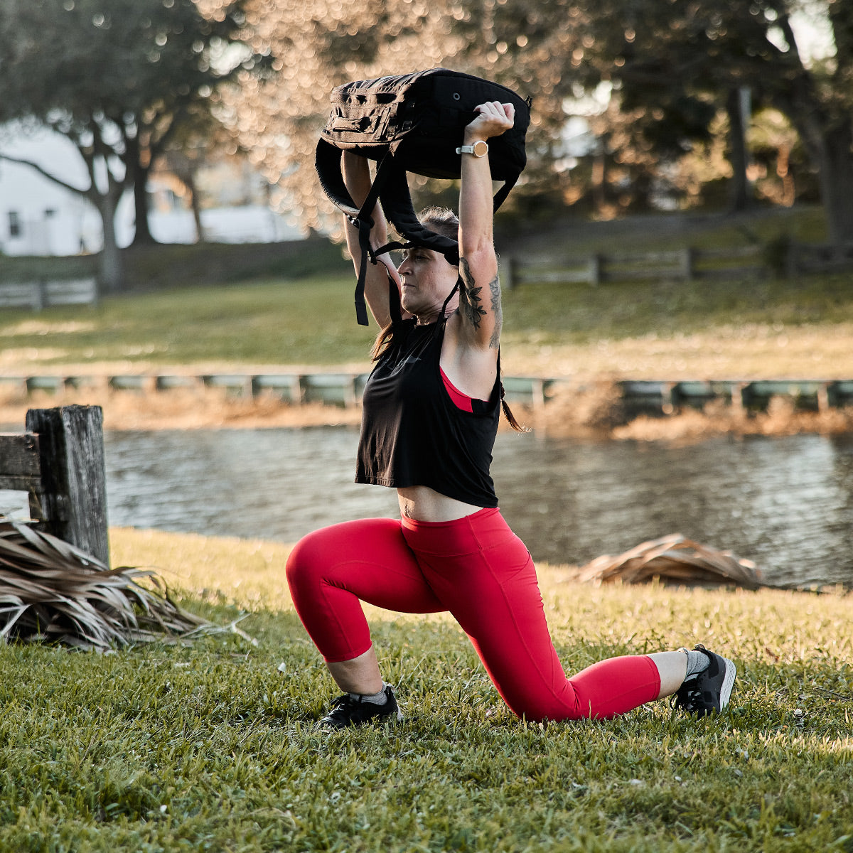 Woman working out in Cropped Training Leggings Pocket High-Risk Red