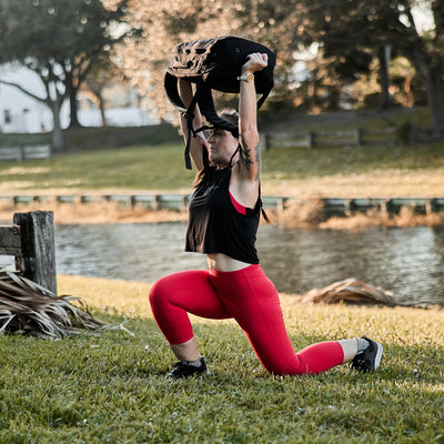 Woman working out in Cropped Training Leggings Pocket High-Risk Red