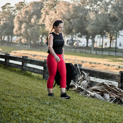 Woman working out in Cropped Training Leggings Pocket High-Risk Red