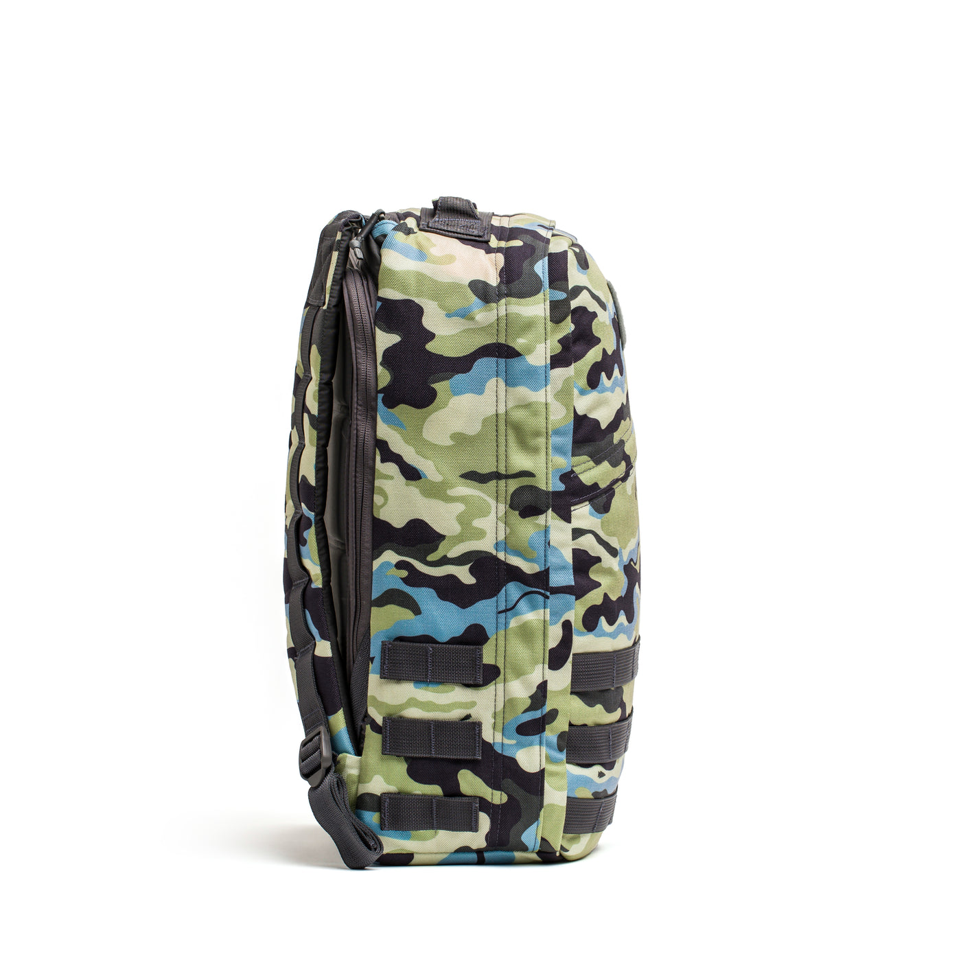 The GR1 USA - Cordura (The Original Ruck) by GORUCK is a robust rucksack in a camouflage pattern with black straps, standing upright against a white backdrop, reminiscent of Special Forces gear.