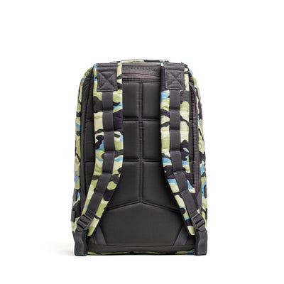 The GORUCK GR1 USA - Cordura (The Original Ruck) is a robust rucksack boasting a camouflage pattern, complete with padded shoulder straps and a stylish black back panel, viewed from behind. Ideal for Special Forces missions.