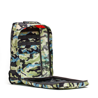 The GR1 USA - Cordura backpack by GORUCK boasts a camo pattern with open zippers and an array of interior pockets, all crafted to offer the durability you'd expect from a Special Forces rucksack.