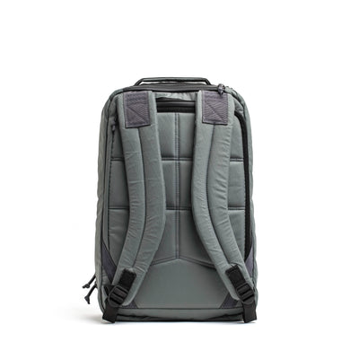 From the rear view, the GR1 USA - X-PAC by GORUCK showcases its padded straps and quilted texture. This rucksack employs X-PAC material for a stylish design with black detailing, ensuring durability and waterproof capability for everyday use.