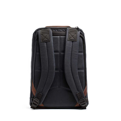 GR1 USA - Heritage rucksack by GORUCK, featuring padded shoulder straps and brown leather accents, displayed from the rear view.