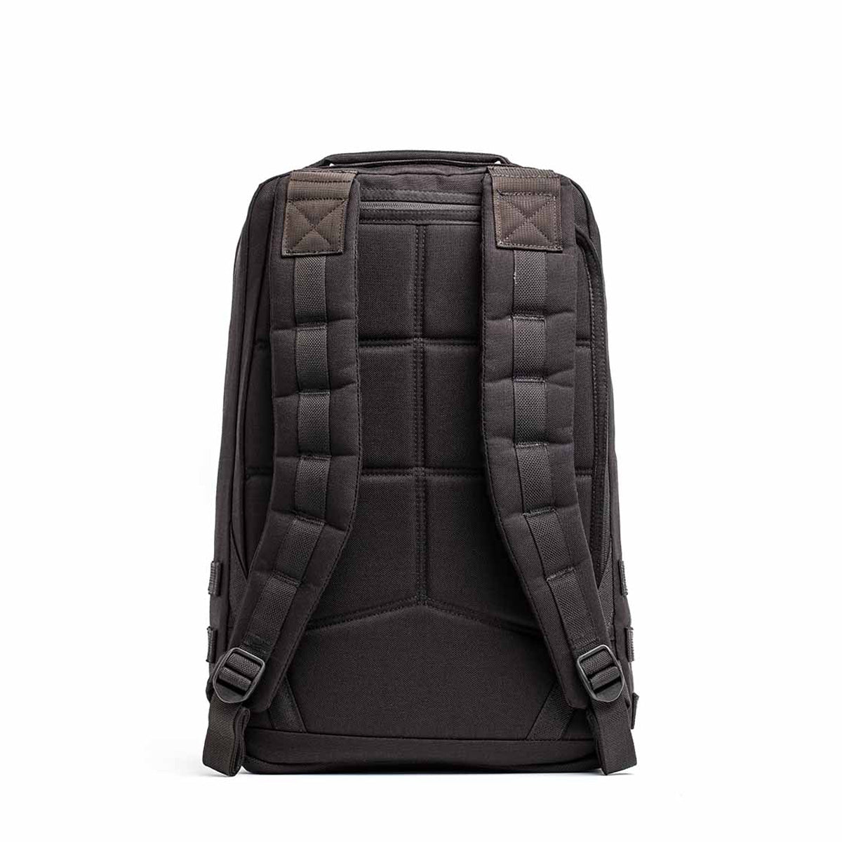 The GR1 USA Throwback is a black backpack crafted from durable 1680 ballistic nylon, featuring a bombproof laptop compartment, padded straps, and a top handle, viewed from the back against a white background.