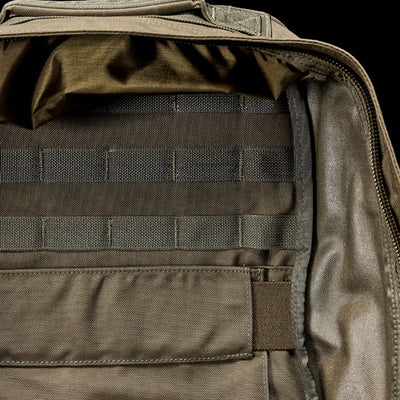 The GR1 USA - Cordura, also known as The Original Ruck, is crafted from Special Forces-grade materials and features MOLLE webbing with detailed zippers in a military-style backpack.