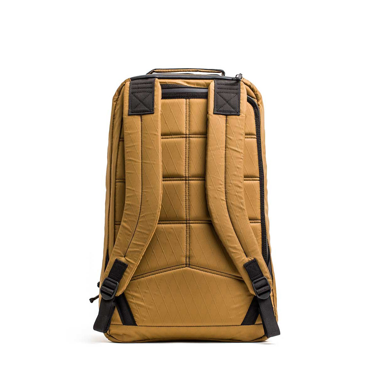 The GR1 USA - X-PAC is a tan rucksack featuring a back view with padded shoulder straps, crafted from waterproof X-PAC material with black accents, shown against a white background.