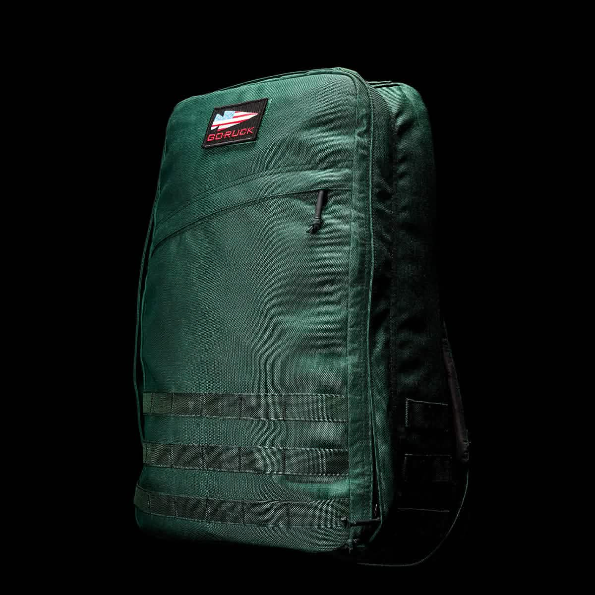 The GR1 USA - Cordura (The Original Ruck) by GORUCK, a sleek green backpack perfect for Special Forces training and the GORUCK Challenge, is designed for durability in outdoor use and displayed against a black background.