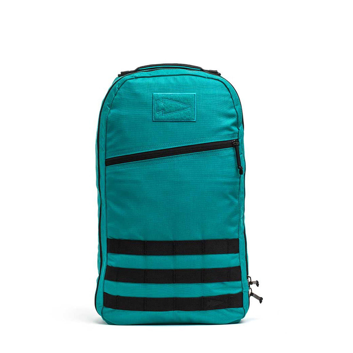 The Bullet Ruck Classic - Cordura is a teal 15L daypack with a streamlined design, featuring black horizontal straps, a diagonal front zipper, and a durable Cordura back panel.