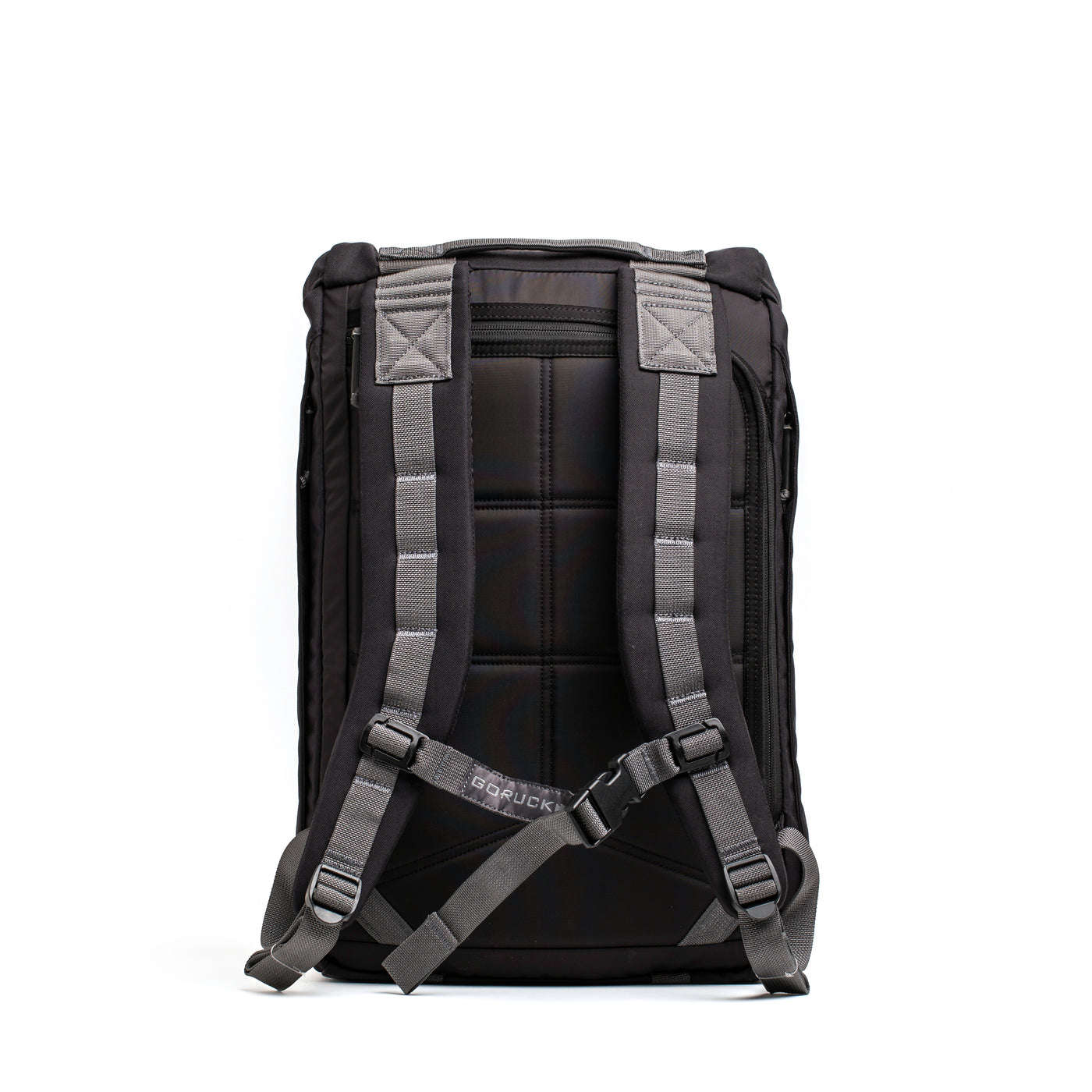 The GORUCK M23 - Cordura rucksack boasts a sleek and modern design in black, crafted from durable materials with gray straps. Its padded sections ensure comfort, and the visible brand logo on the strap adds an element of style. Perfectly showcased against a white background, this rucksack combines practicality with fashion-forward appeal.