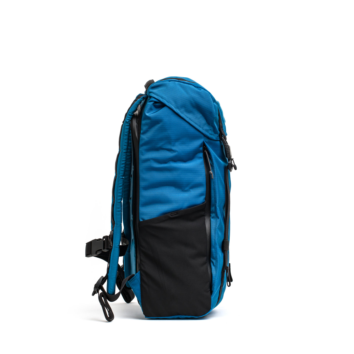 Side view of the GORUCK M24 - Ripstop ROBIC® rucksack, showcasing its durable materials in a sleek blue and black design, featuring multiple compartments and adjustable straps.