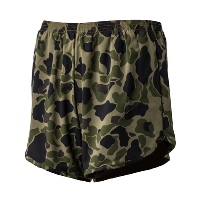 The GORUCK Men’s Ranger Panties - ToughStretch feature a classic camouflage design in shades of green, brown, and black for a military-inspired look. Crafted with ToughStretch fabric for enhanced durability, these shorts have an elastic waistband for added comfort. They also come with the Scars Lifetime Guarantee to ensure lasting wear.