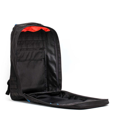 The GORUCK X mikeroweWORKS Bundle, a black backpack perfect for rugged tasks, boasts an orange interior and organized compartments, showcased stylishly on a white background.