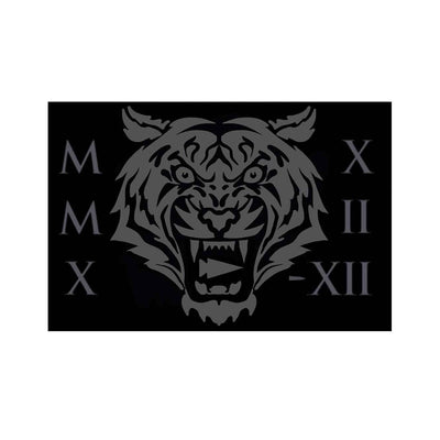 A stylized gray tiger face with Roman numerals MMX, XII, and XII on a black background, evocative of the GORUCK TRIBE 2022 patch.