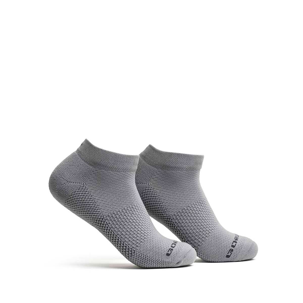 Experience unmatched comfort with our Race Day Socks. Featuring a textured pattern in gray, they ensure maximum breathability and reinforced high friction areas for mile after mile of support.