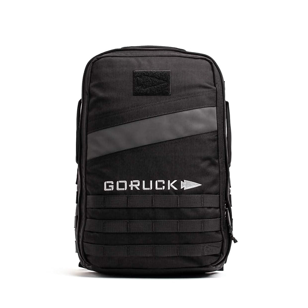 The Rucker 4.0 in black, featuring a diagonal stripe and front logo, offers tactical design elements ideal for carrying Ruck Plates during rucking activities.