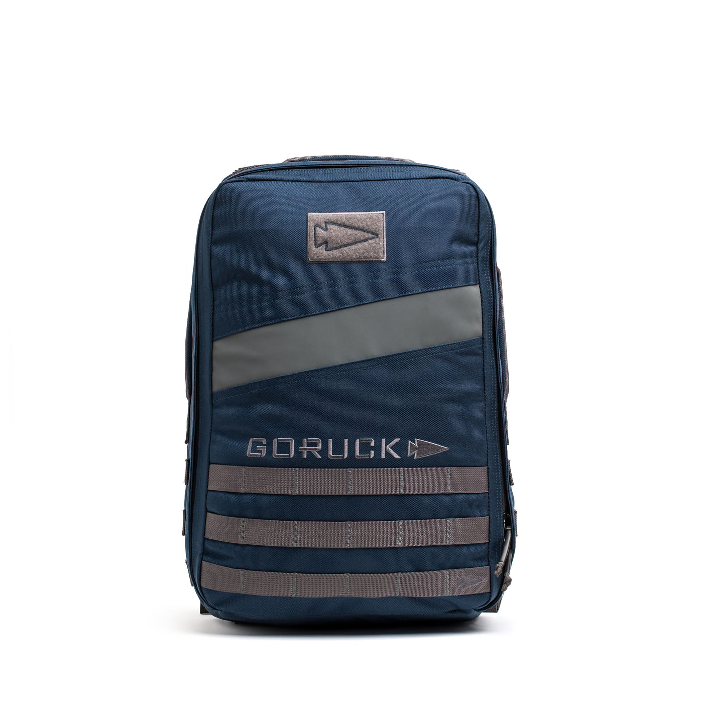 The navy blue Rucker 4.0 backpack with gray accents and logo features a dedicated Ruck Plate compartment, shown standing upright on a white background.