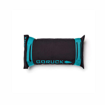 The Simple Training Sandbag in Black and Teal features the "GORUCK" logo, durable padded handles, and is displayed on a white background. It includes the trusted Scars Lifetime Guarantee.