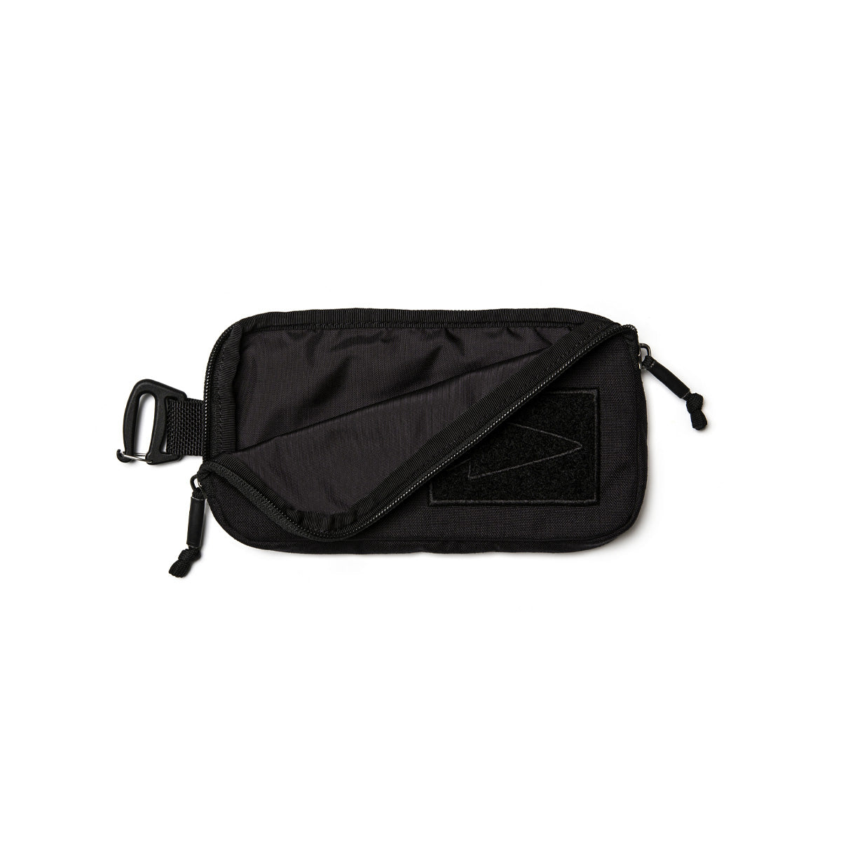 A black rectangular GORUCK Sternum Pouch - Cordura with a partially open zipper reveals a small interior compartment. It includes a hook on one side and a Velcro patch on the front, ideal for attaching to your Rucker or any MOLLE-compatible gear.