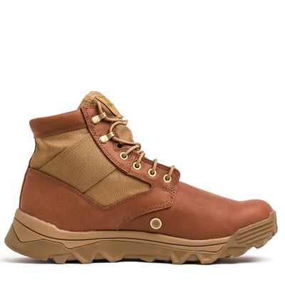 The MACV-2 Mid Top in Briar and Coyote, displayed from the side on a white background, features a rugged sole with metallic eyelets and an aggressive triple compound outsole.