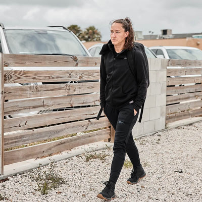 Woman walking outdoors, Woman is wearing Women's Performance Joggers.