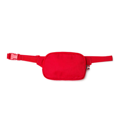 GORUCK's Belt Bag is a compact red accessory featuring adjustable webbing and a small zippered front pocket. It has a rectangular shape and is secured with a plastic buckle.