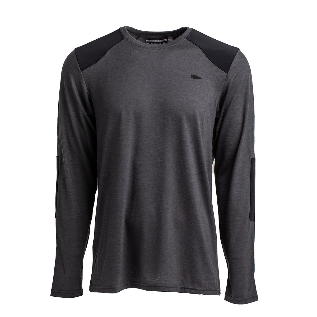 The GORUCK Men’s Commando Long Sleeve - Merino Wool is a gray athletic shirt with long sleeves, highlighted by black shoulder and elbow patches with reinforced paneling, all set against a white background.