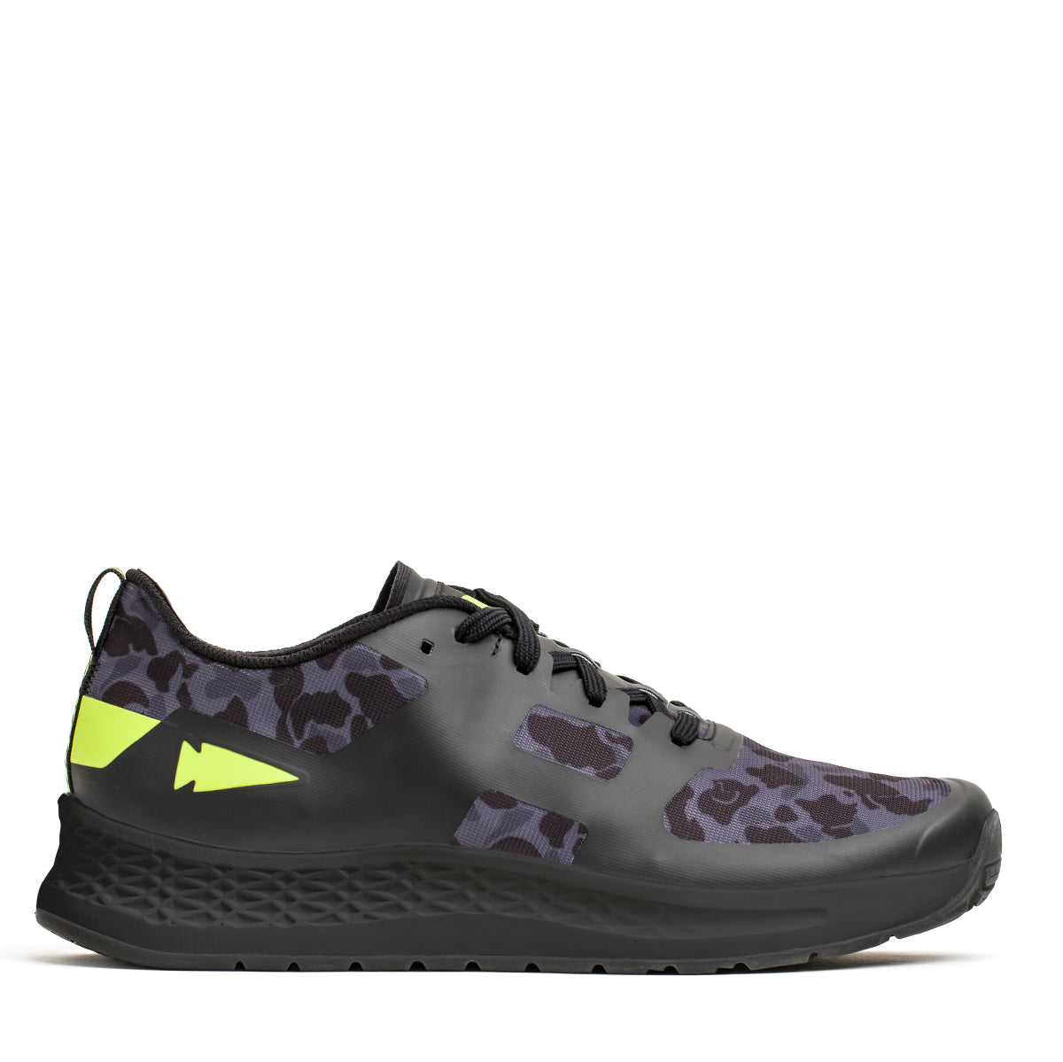 Introducing the Women's Rough Runner - Midnight Frogskin + Acid Lime by GORUCK: This athletic shoe showcases a sleek black design with dark camo patterns, accented with vibrant acid lime highlights on the side and heel. It features a textured sole and black laces, enhanced by a GRADIENT DENSITY EVA MIDSOLE to ensure maximum comfort. Ideal for Rough Runner enthusiasts who appreciate a modern, sporty aesthetic.